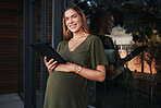 Portrait, tablet and balcony with a pregnant woman at her business office at the start of her maternity leave from work. Tech, smile or pregnancy with a happy young employee planning at her workplace