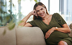 Business woman, pregnant and smile in portrait, modern office and relax with hand on stomach, care and maternity. Happy mother, pregnancy glow and lounge couch in corporate workplace with pride