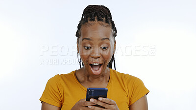 Buy stock photo Woman, smartphone or winner notification with surprise on technology, gen z aesthetic and white background. Black person, smile or digital news on mobile, competition announcement and studio mockup 