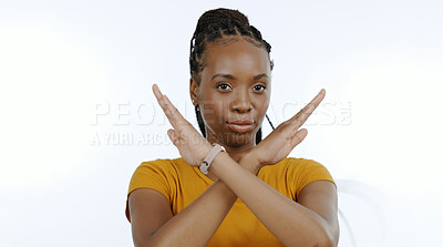 Buy stock photo Portrait, woman and cross sign for stop, no and protest in studio for rejection, ban and wrong emoji on white background. Face, african model and warning of caution, cancel or objection of inequality