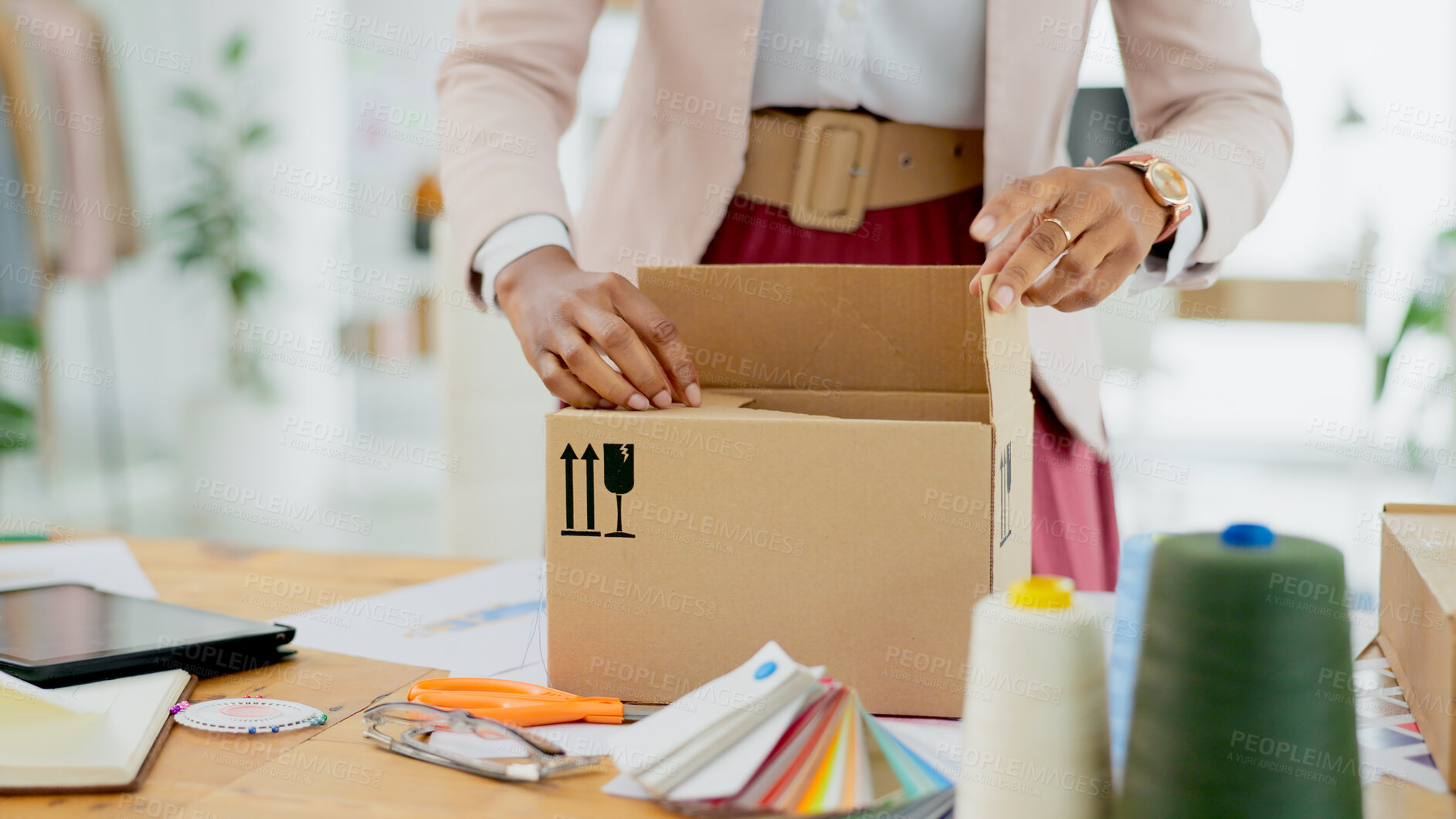 Buy stock photo Woman, hands and box of fashion designer in small business, supply chain or logistics at boutique store. Closeup of female person packing boxes for clothing, delivery or courier service at shop