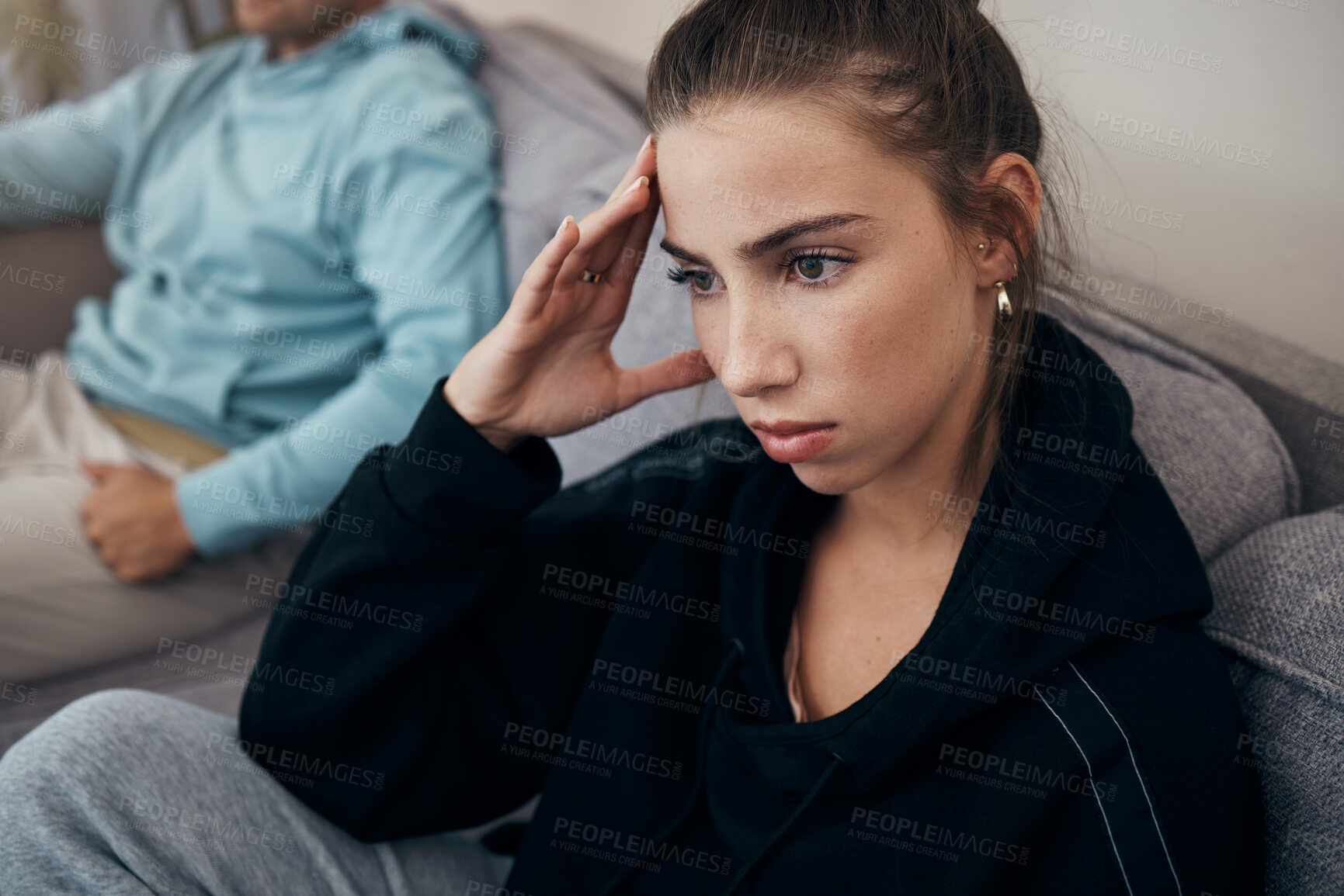 Buy stock photo Divorce, stress and angry couple on a sofa after fighting, argue or infertility problem at home. Marriage, conflict and frustrated woman in living room overthinking, anxiety or sad with cheating man