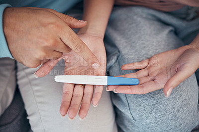 Buy stock photo Hands, couple and closeup of pregnancy test, results and waiting for news together in home. Top view, kit and pregnant woman and man family planning for future maternity, ivf fertility and support