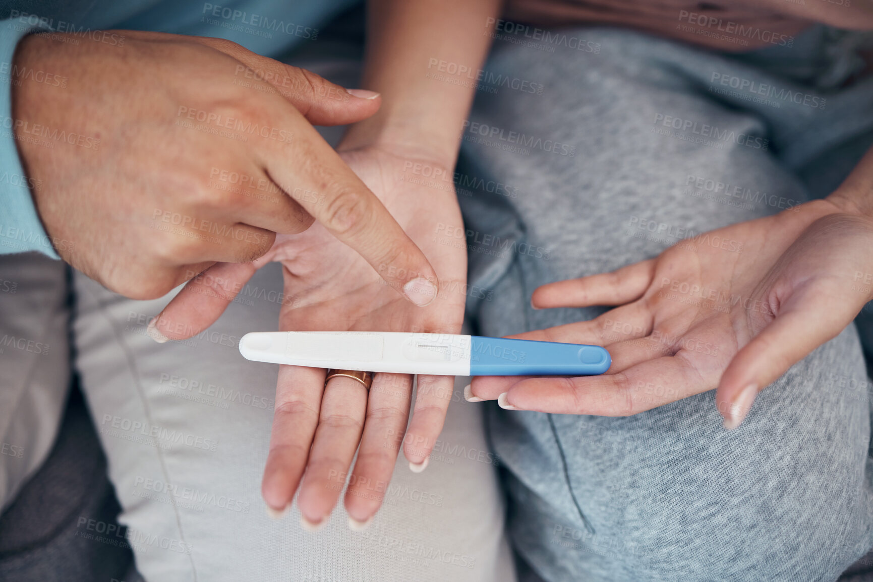 Buy stock photo Hands, couple and closeup of pregnancy test, results and waiting for news together in home. Top view, kit and pregnant woman and man family planning for future maternity, ivf fertility and support