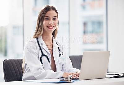 Buy stock photo Portrait, doctor and laptop with a woman at work in a hospital for healthcare, consulting or trust. Medical, research and smile with a happy young medicine professional working at a desk in a clinic