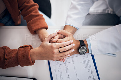 Buy stock photo Diagnosis, results and doctor holding hands with patient for support, care and kindness in clinic or hospital. Healthcare, empathy and counseling person with medical, report and announcement of news