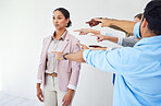 Pointing, woman and workplace bullying from business people in an office for new employee. Serious, company and workers, friends or a team with a gesture to a female for group gossip or rumor