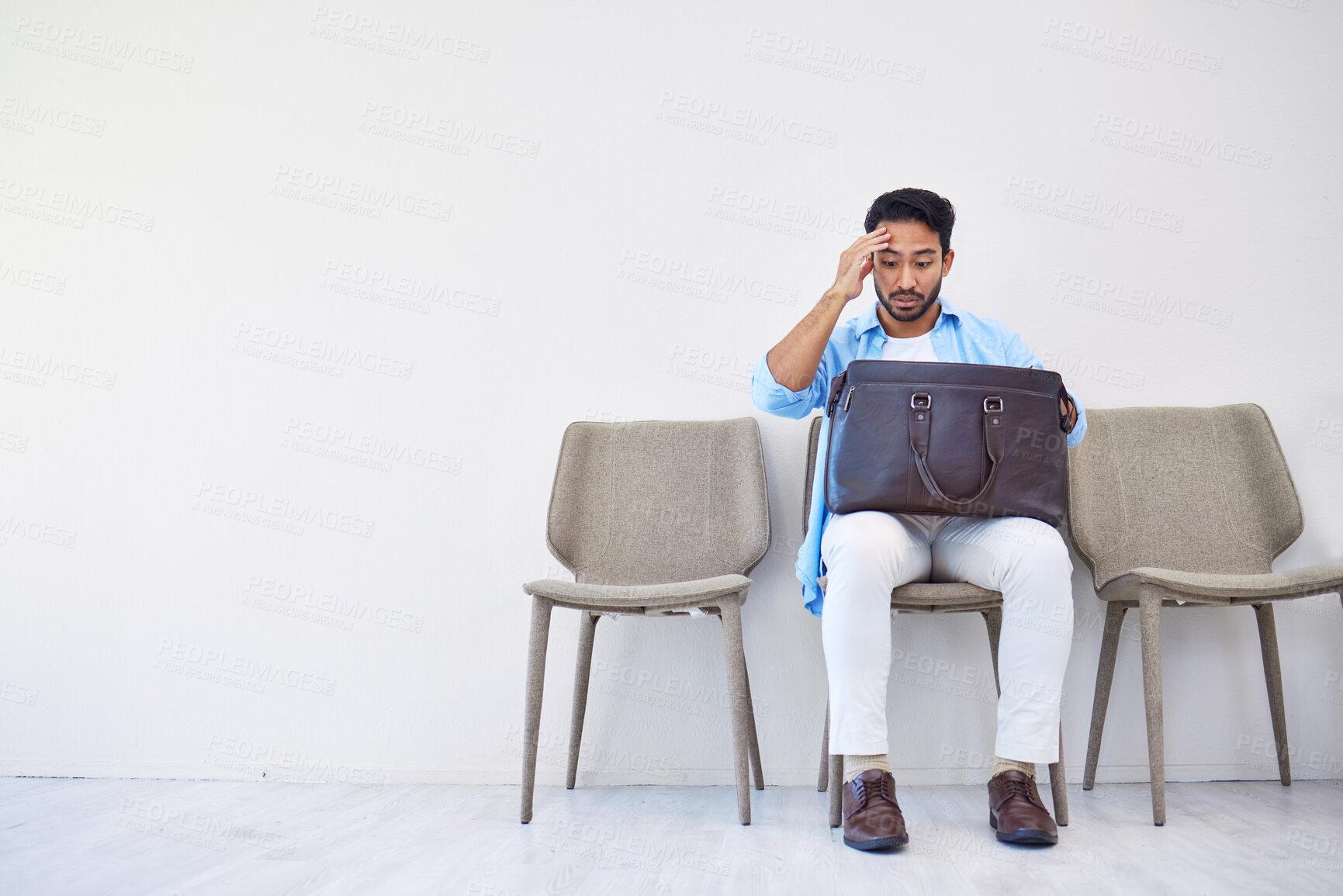 Buy stock photo Bag, stress and man search in waiting room for interview, hiring and recruitment with lost resume in briefcase. Problem, finding and person forget laptop or keys by mistake, frustration and worried