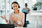 Happy woman, laptop and call center with headphones consulting in customer service or telemarketing at office. Female person, consultant or agent smile for online advice or contact us at workplace