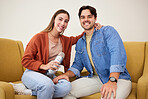 Portrait, microphone and podcast with a couple on a sofa in the living room of their home together. Smile, radio or talkshow with a happy young man and woman in their house for live streaming