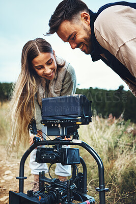 Buy stock photo Camping, camera and couple in nature with photography equipment for shooting on outdoor adventure. Forest, fun and photographer people prepare device for recording podcast or blog content for travel