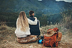 Couple, hug and relax at lake on camping, adventure or travel in mountain, nature or environment. People, hiking and bonding together in embrace for support or care on journey in forest and woods