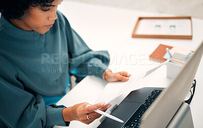 Buy stock photo Woman, laptop and documents in finance, budget planning or invoice for investment or policy at office. Female person, employee or accountant checking paperwork, bills or company expenses at workplace