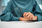 Magnifying glass, investigation and person hand with detective, study and business employee. Lens, crime search and evidence scan with spy magnifier, solution and analysis for knowledge in office