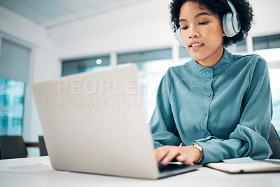 Buy stock photo Headphones, laptop and woman typing in the office doing research for creative project. Computer, technology and professional female designer working, planning and listening to music in workplace.