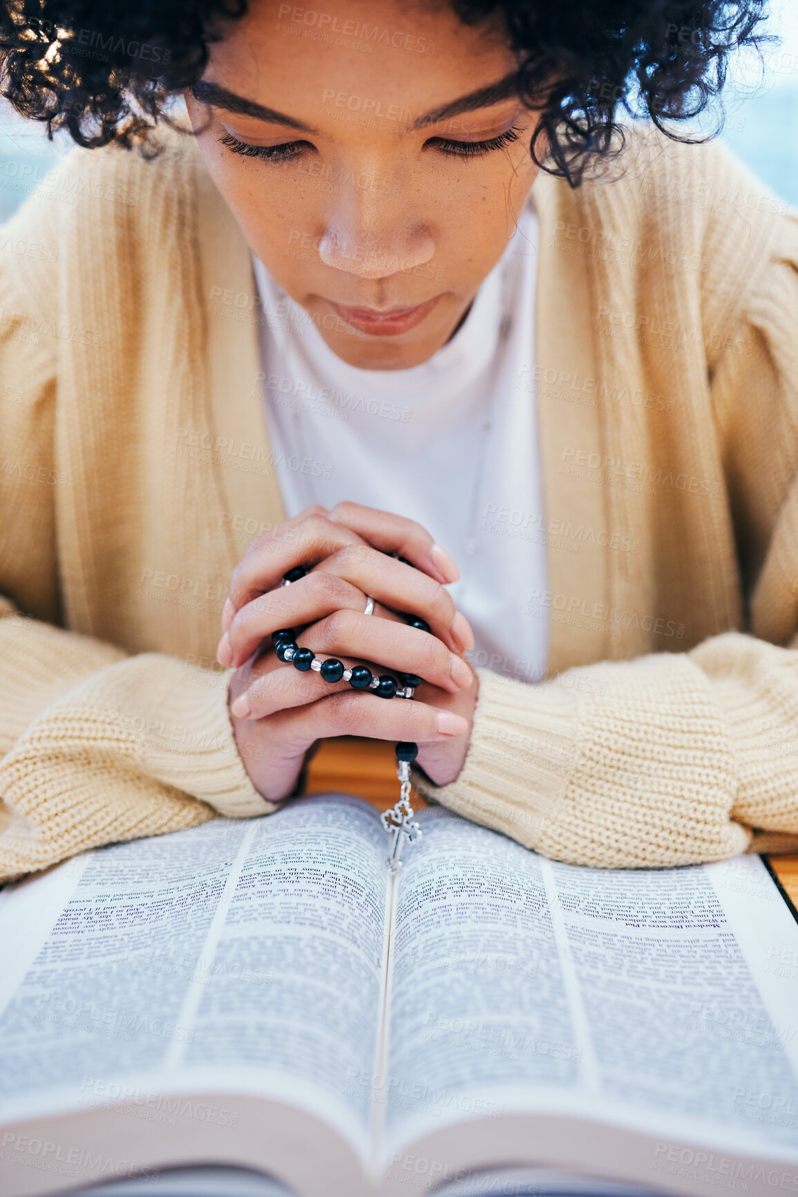 Buy stock photo Praying, bible and woman with religion, rosary and spiritual with guidance, healing or Christian with faith. Person, girl or believer with holy scripture, book or home with help, worship or gratitude