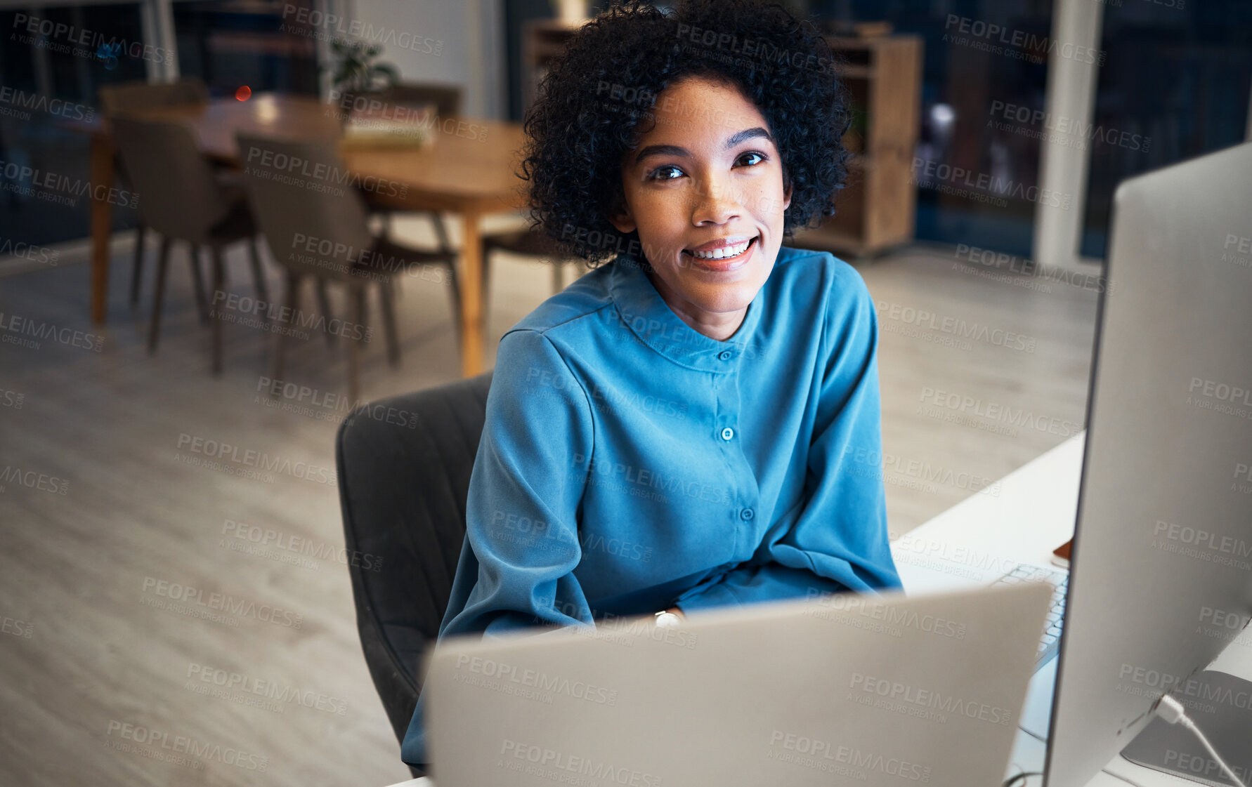 Buy stock photo Portrait of woman with computer, research or schedule planner with overtime in human resources office administration. Smile, face girl at desk, receptionist or secretary at startup business at night.