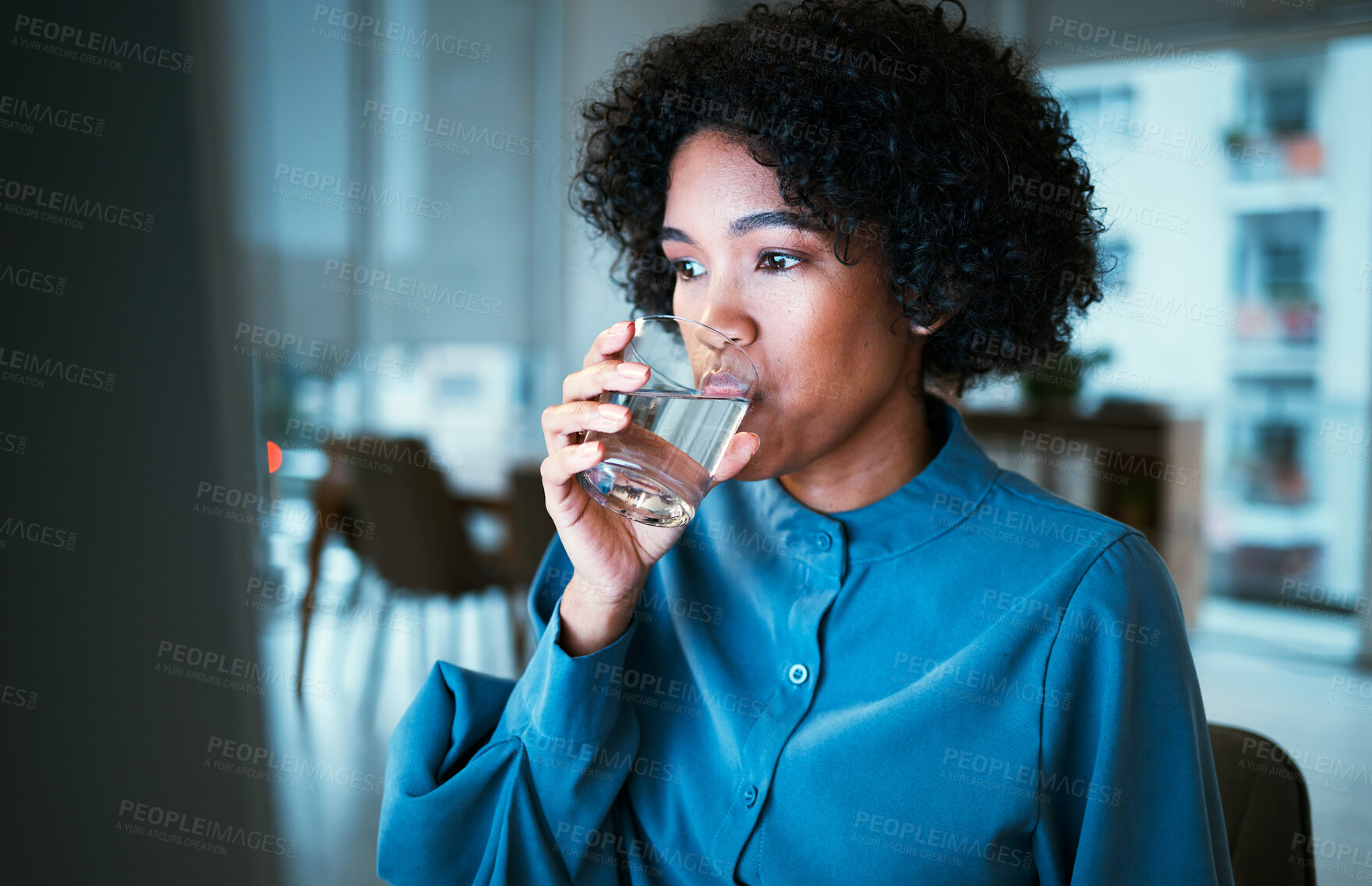 Buy stock photo Woman, drinking water and night in office, reading or thinking for hydration, wellness or finance company. Accountant, glass and computer for nutrition, diet or detox for health, idea or workplace