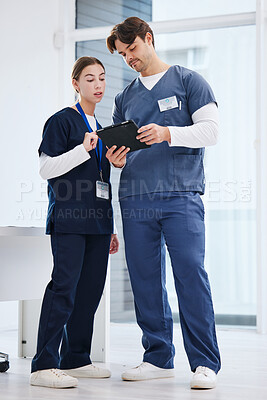 Buy stock photo Healthcare, man and woman with tablet in office at hospital with research, advice and teamwork. Medical professional, nurse and doctor with digital app for telehealth, insurance website and schedule.