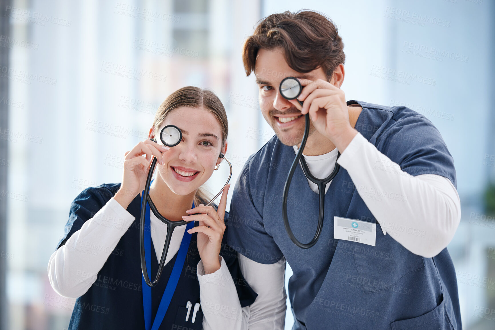 Buy stock photo Portrait, healthcare and stethoscope with nurse friends having fun in the hospital together for cardiology. Smile, funny or comedy with a man and woman medicine professional in a medical clinic