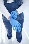 Gloves, hospital and hands of doctor for surgery, medicine and working in clinic for wellness. Healthcare, help and person with ppe for safety, protection and hygiene in medical service or procedure