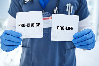 Buy stock photo Life, choice and doctor with paper in hands for abortion, human rights or decision in clinic. Nurse, poster and vote for women with option for family planning in hospital or medical contraception