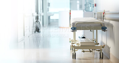 Buy stock photo Healthcare, medical and a bed in the corridor of a hospital after work, ready for an emergency or accident. Medicine, wellness and service with a gurney in the empty hallway of a health clinic