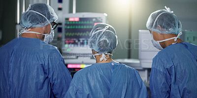 Buy stock photo Teamwork, back or surgeon in surgery emergency procedure or healthcare operation in hospital. Night, monitor or doctors in face mask or collaboration helping in dark theatre room in medical clinic