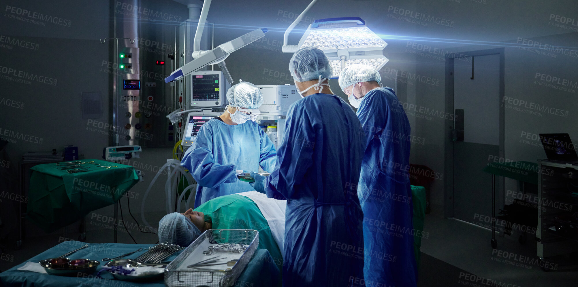 Buy stock photo Healthcare, teamwork and doctors in a hospital for an operation together, working in theater to save a life. Medical, emergency and a surgeon team in the operating room of a clinic for surgery