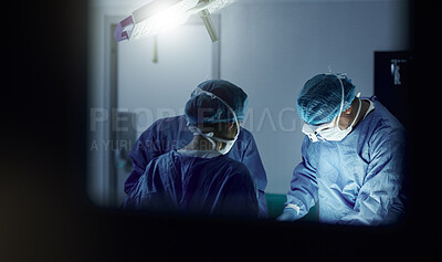 Buy stock photo Teamwork, emergency and doctors in a hospital for surgery together, working in theater to save a life. Medical, healthcare and a surgeon team in the operating room of a clinic for an operation