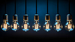 Hanging lightbulbs. Innovation, data connection concept. Teamwork technology development