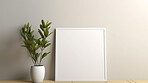 Canvas mockup against beige wall. Empty canvas on table top for your design.