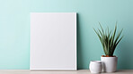 Canvas mockup against blue wall. Empty canvas on table top for your design.