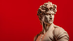 Sculpture or statue of David with angry or annoyed expression on red background