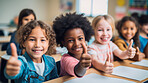 Group of kids in classroom showing thumbs up. Positive happy education