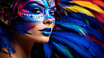 Closeup colorful makeup or face paint and feathers on model. Creative art background