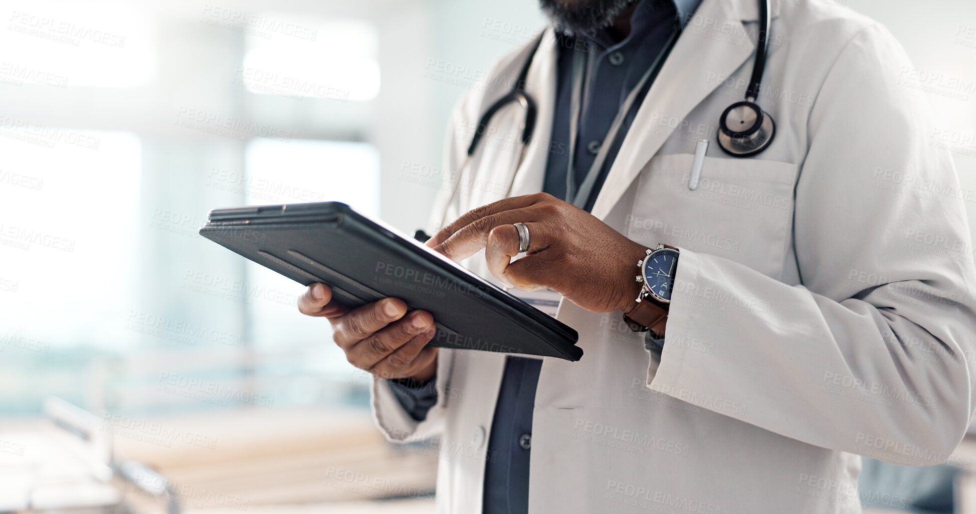 Buy stock photo Closeup, man and doctor with a tablet, internet or connection with online results, digital app or typing. Person, employee or medical professional with technology, healthcare or website information
