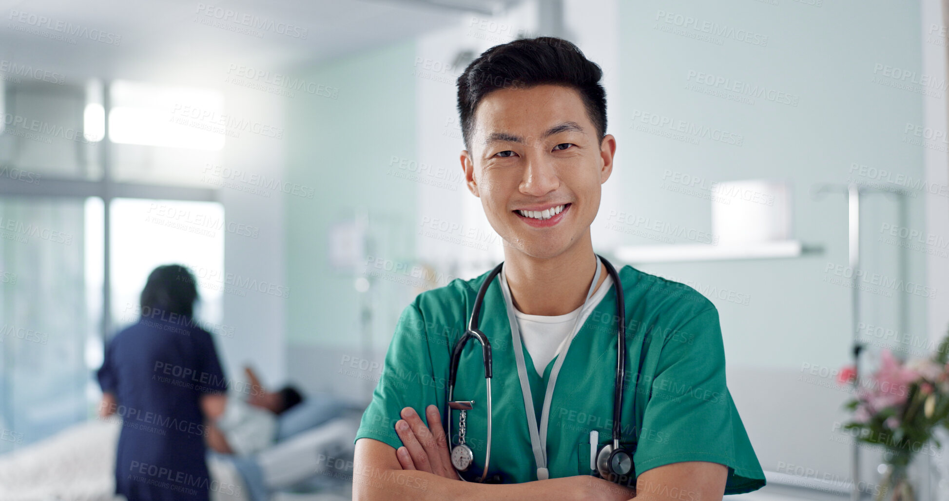 Buy stock photo Face, happy nurse and Asian man with arms crossed in hospital for healthcare, wellness and medicine. Portrait, smile and confident medical worker, professional surgeon and expert employee in clinic