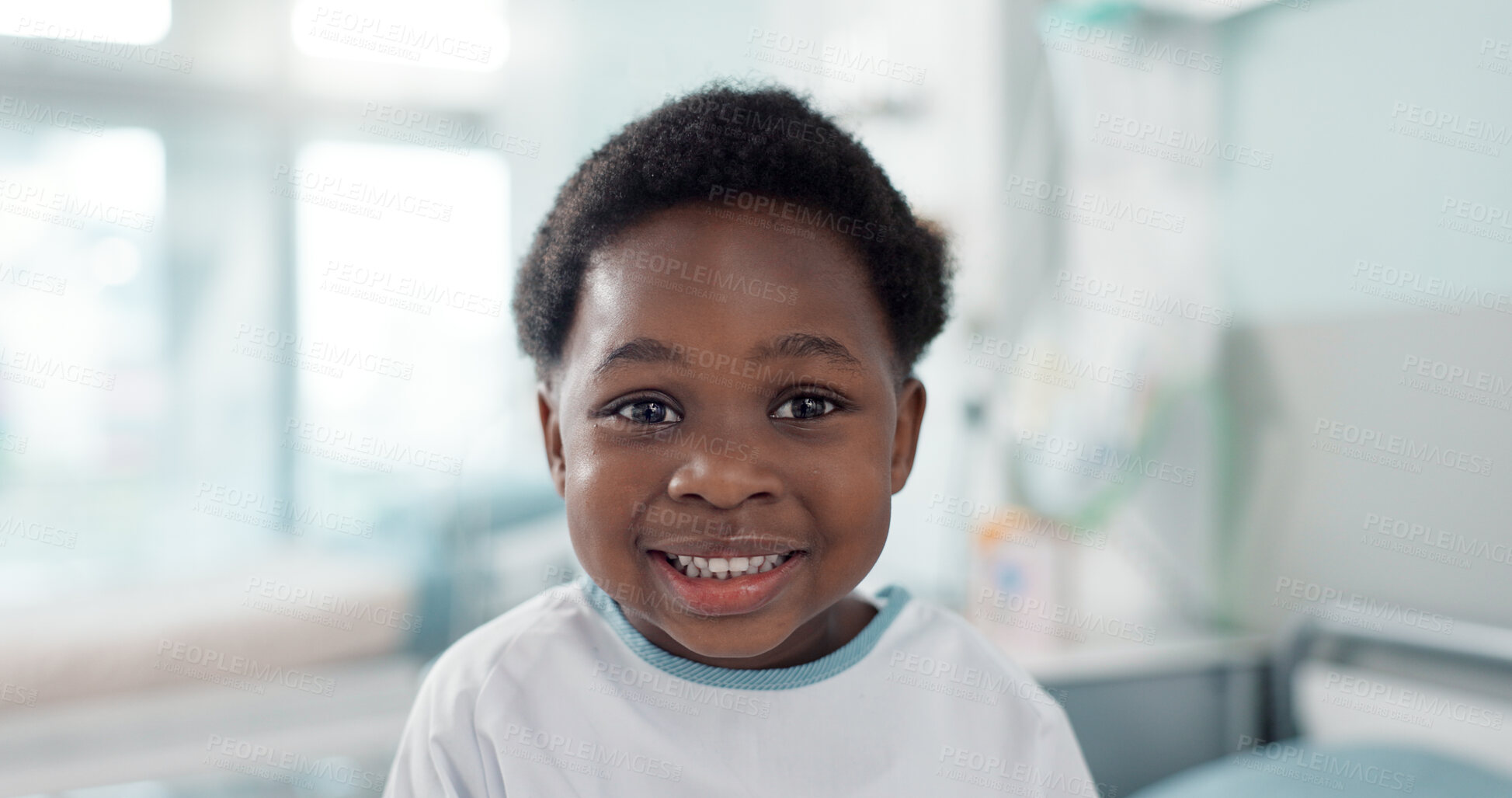 Buy stock photo Face, smile and a boy child patient in the hospital to visit a pediatrician for healthcare or a medical checkup. Portrait, medicine and a happy young african kid in a clinic for treatment or cure