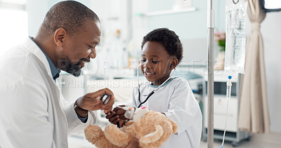 Doctor, African kid and stethoscope for teddy bear, smile or play for recovery from surgery, game or breathing. Child patient, medic and boy with toys, talk or consulting for rehabilitation in clinic