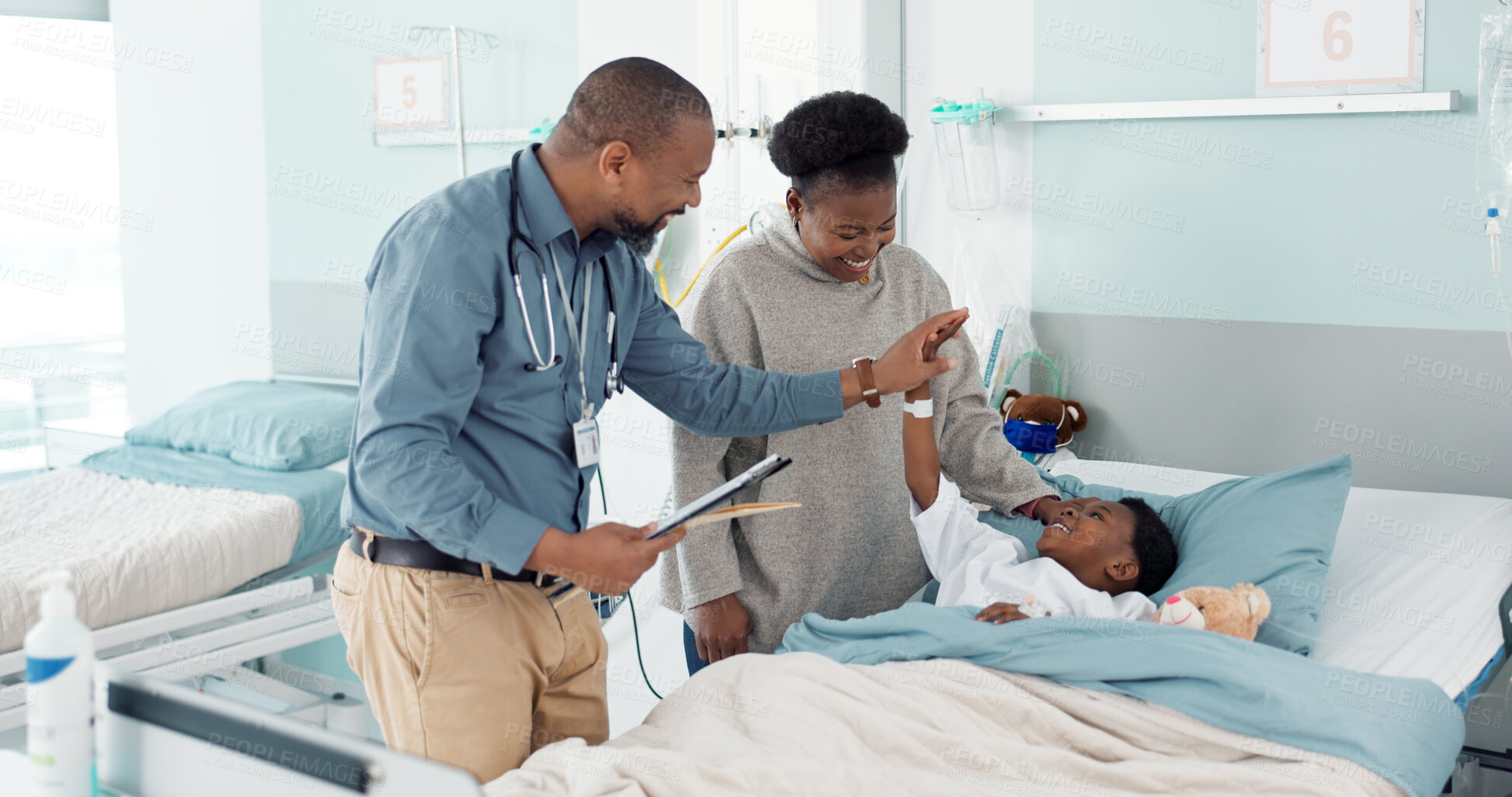 Buy stock photo Doctor, high five and child in hospital, bed or healing in clinic with results or celebration in surgery rehabilitation. Happy, kid and surgeon support patient, mother and success in healthcare