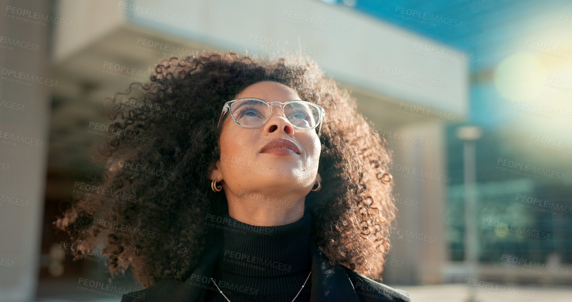 Buy stock photo Face, vision and wind with a business black woman in the city for growth, opportunity or inspiration. Thinking, street and smile with a happy young employee looking around an urban town for ideas