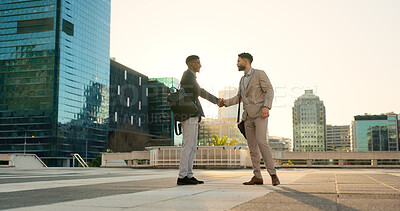 Partnership, walking or business people shaking hands in city for project agreement or b2b deal. Teamwork, outdoor handshake or men meeting for a negotiation, offer or networking opportunity together