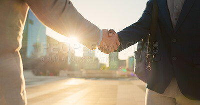 Teamwork, closeup or business people shaking hands in city for project agreement or b2b deal. Hiring, outdoor handshake or men meeting for a negotiation, offer or partnership opportunity on rooftop