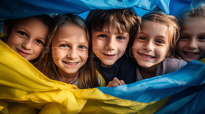 Happy children with Ukraine flag. Symbol for patriotism, freedom, and growth concept