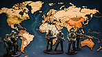 World map with toy soldiers. War and military political crisis concept