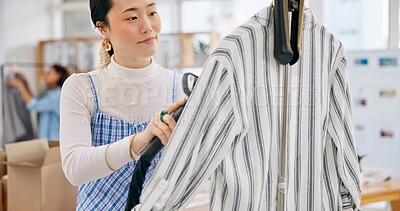 Buy stock photo Asian woman, fashion designer and steam clothing in logistics, small business or quality service at boutique. Female person in dry cleaning, retail store or product preparation for delivery at shop