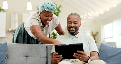 Black couple, laughing and tablet on a home sofa for streaming, meme and internet in a living room. African woman and man together to talk about tech, funny post or video on social media or network