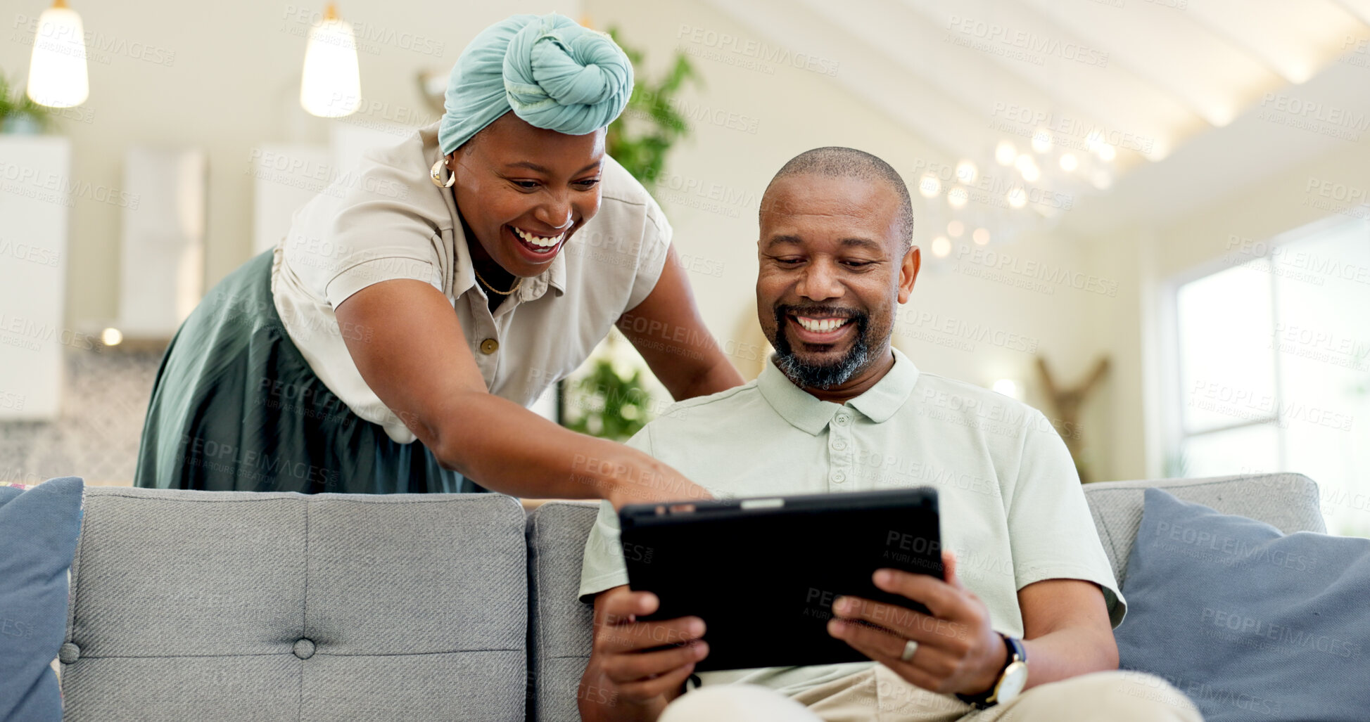 Buy stock photo Black couple, laughing and tablet on a home sofa for streaming, meme and internet in a living room. African woman and man together to talk about tech, funny post or video on social media or network