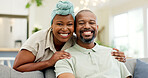 Black couple, relax and smile on a home sofa for happiness, love and care in a living room. Face of an African woman and man together for affection, portrait and hug or comfort in a happy marriage